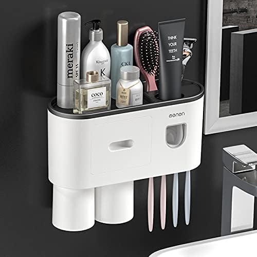 NC Creative Toothbrush Racks sem perfurar enxaguatório bucal Copo pendurado no banheiro pendurado para coletar um creme de dente automático elegante rosa elegante