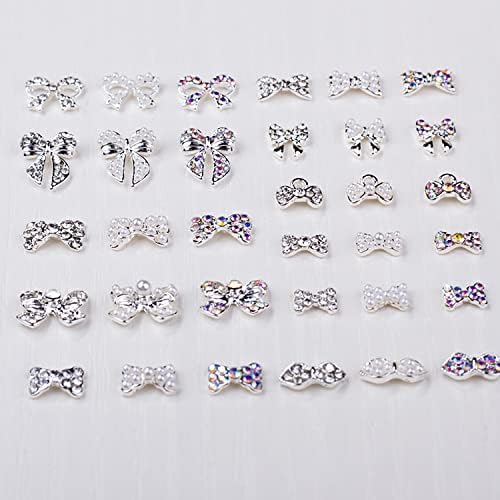 Jerclity 33 peças Ligição da liga de prata Charms de arco para pregos encantamentos de unhas de unhas gemas browknot unhas pregos pérolas embutidas rrogueiras iridescentes para mulheres garotas