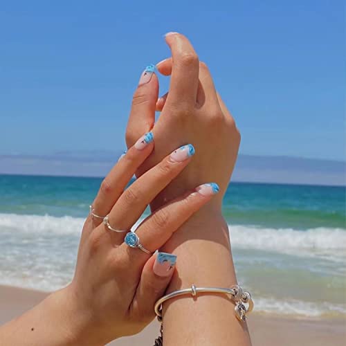 Pressione azul nas unhas quadradas unhas falsas curtas unhas falsas com ondas marítimas de onda de gaivo