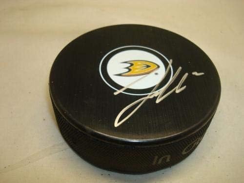 Luke Schenn assinou o Puck de hóquei Anaheim Ducks autografado 1a - Pucks autografados da NHL